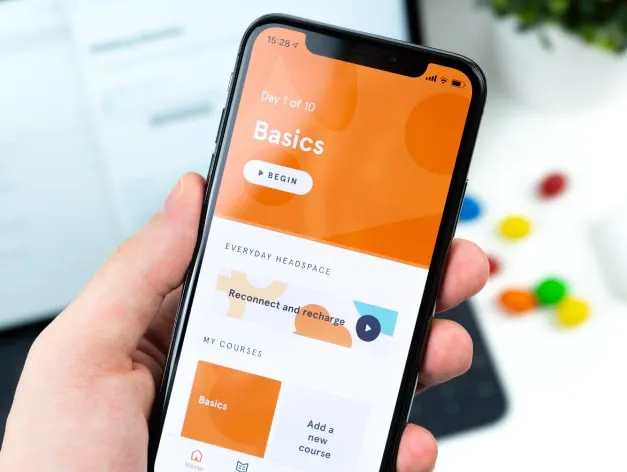 Mobile App Development - Build innovative and user-friendly applications Mobile app development with smartphone interface and coding elements.